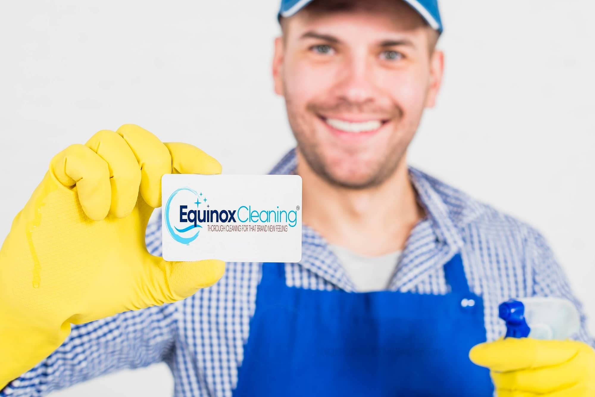 cleaning-concept-with-man-showing-business-card